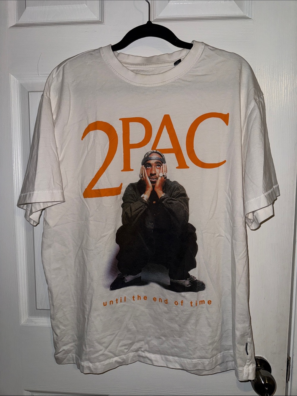 White Short-Sleeve Graphic Tee with Orange '2PAC' Print